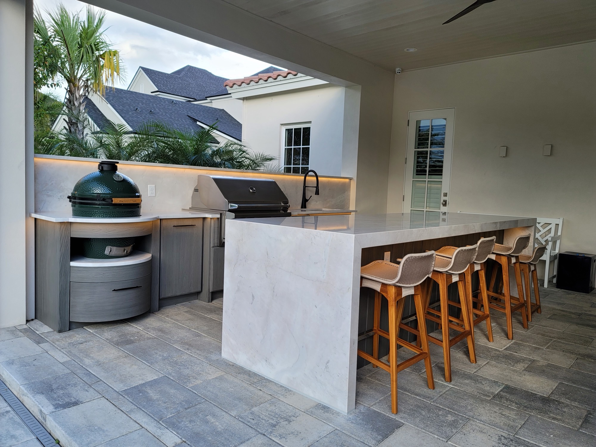The finished outdoor kitchen with NatureKast cabinetry in Baldwin Park, Orlando, FL