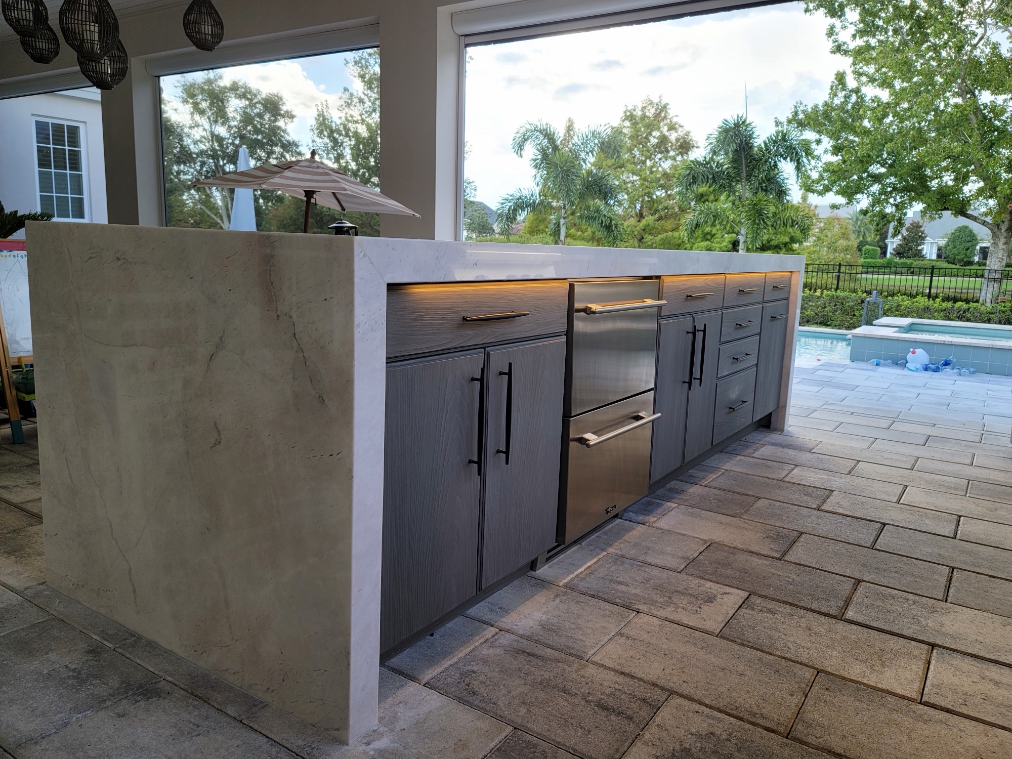 Mitered marble countertop with a waterfall end in Baldwin Park, Orlando, FL