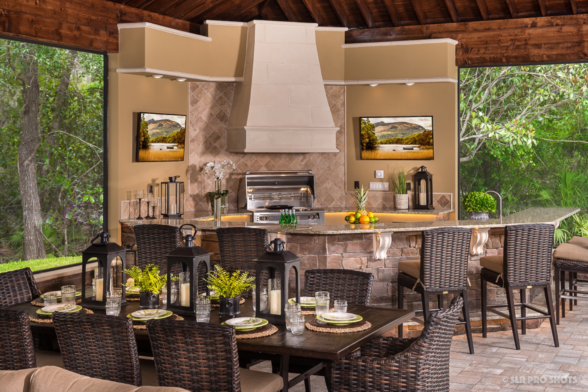 The clamshell outdoor kitchen with grill and precast hood in Geneva, FL