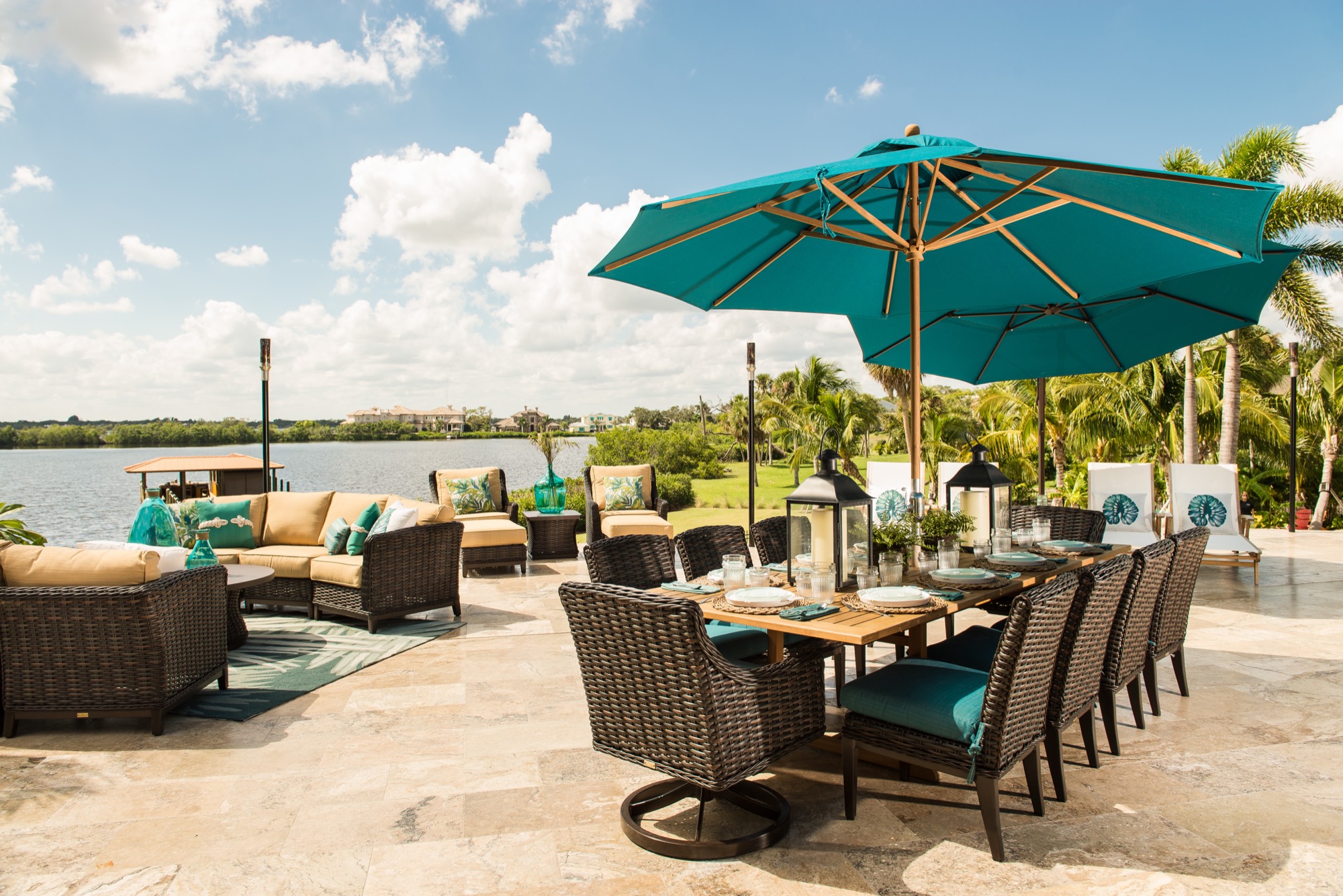 The outdoor kitchen structure with breezeway under the TV wall at the Merritt Island home